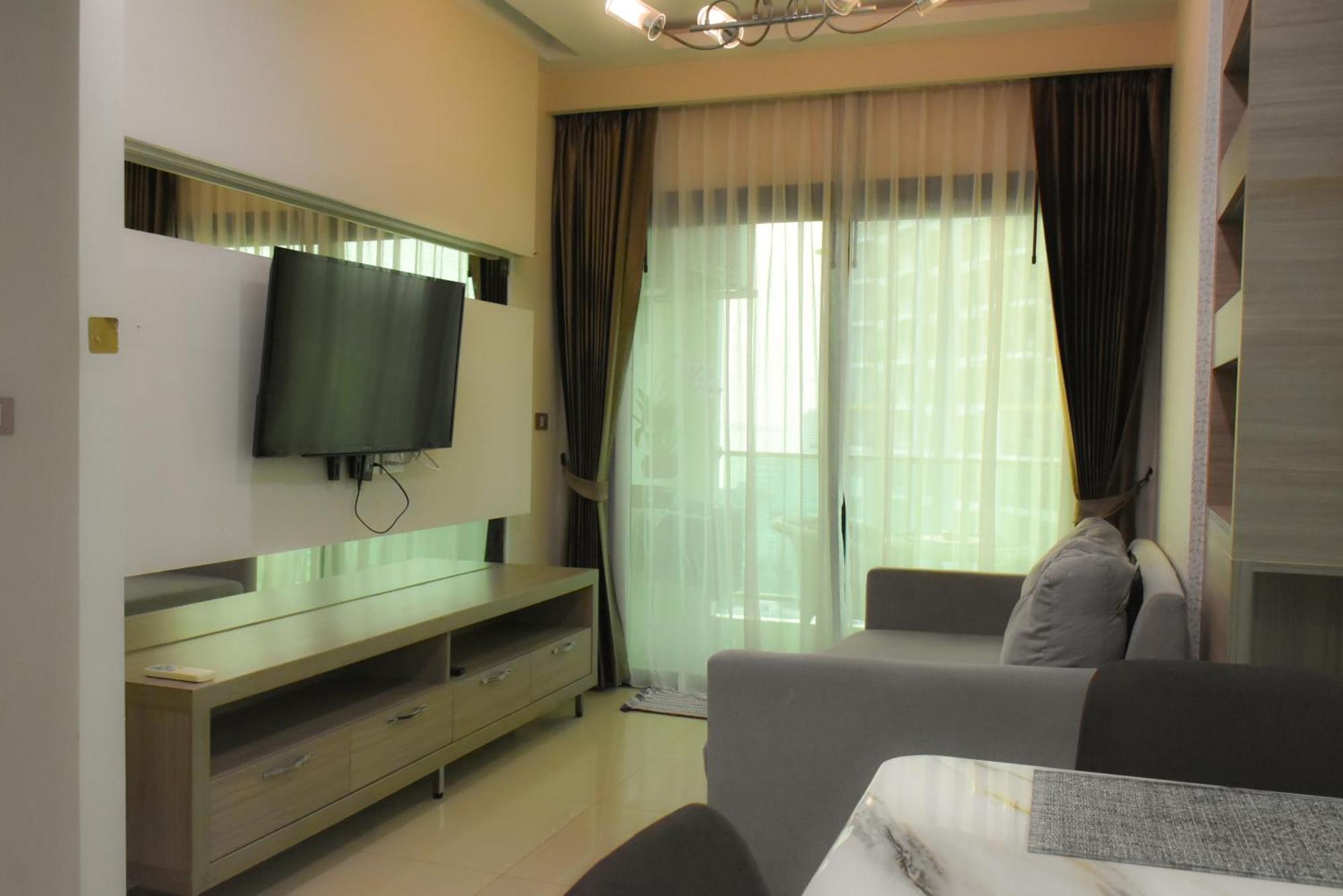 Dusit Grand Condo View Jomtien Beach Oda fotoğraf